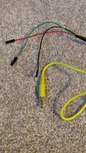audio cable soldered with header pins to connect to amp